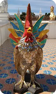 Colourful Thai rooster sculpture with mosaic decoration, symbol of TukTuk-DenHaag