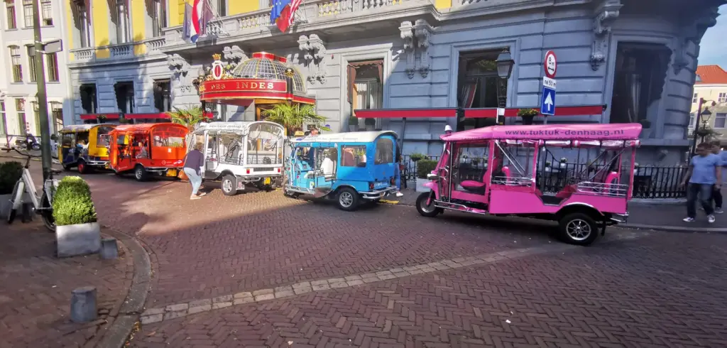 Five tuk tuks ready for a corporate outing at Hotel Des Indes in The Hague